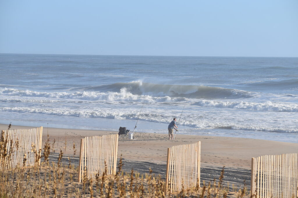 north carolina wave and fisherman