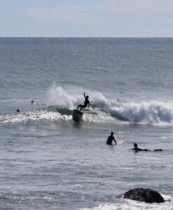 Tommy George surfing for Eye of the Sun Surfboards.