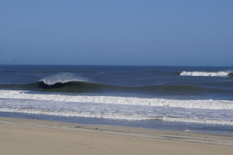 a wave on a sandbar in OBX